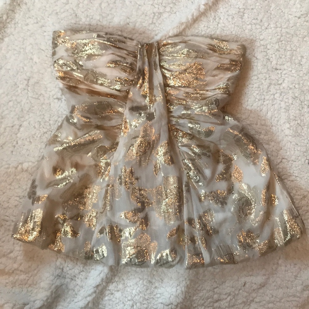 Strapless silk blouse.